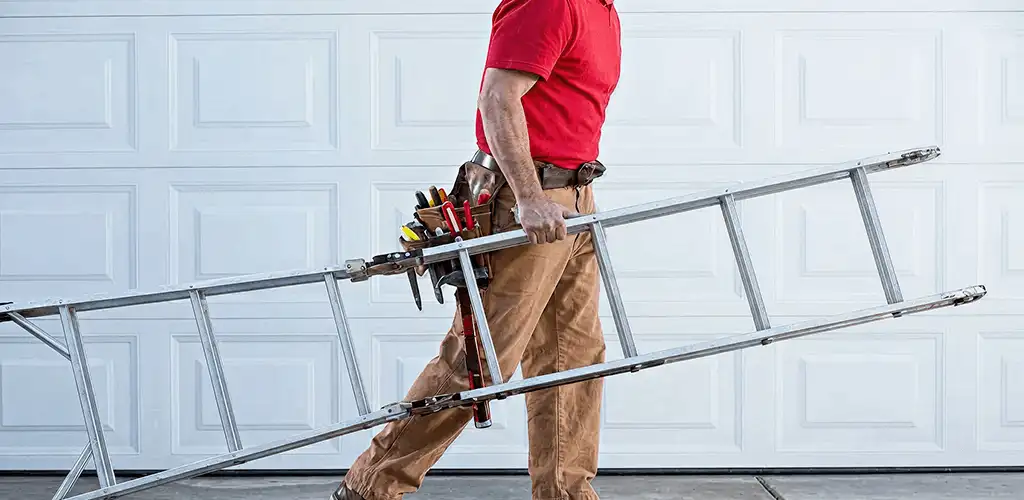 Garage door repair technician arriving with tools and ladder in Saint Louis, MO