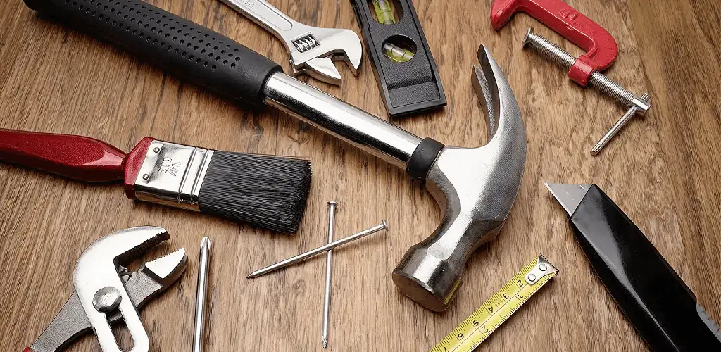 Handyman tools laid out for home repair and maintenance work in Saint Louis, MO