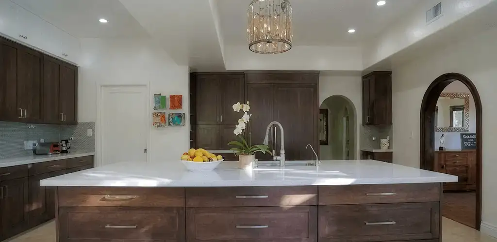 Cabinet refacing project with updated kitchen cabinets and island in Saint Louis, MO